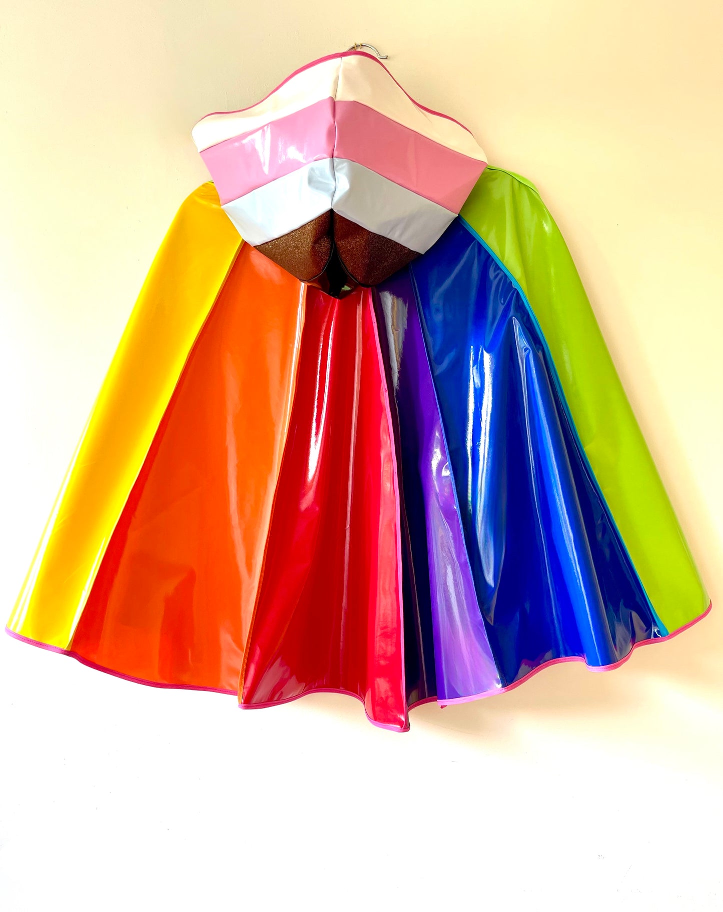 PRIDE cape: water-resistant cape. Feat. progress pride flag colours and intersex symbol.