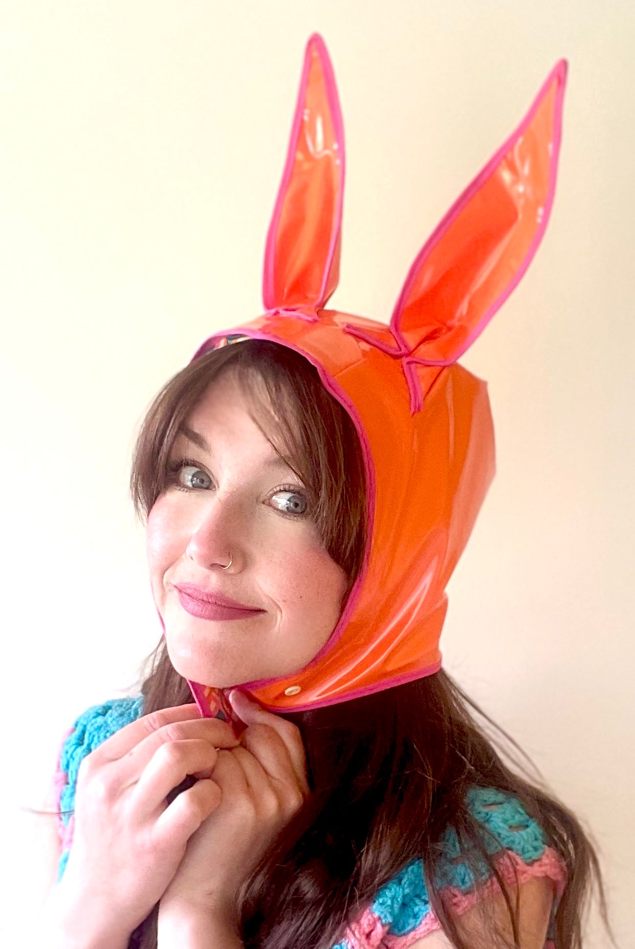 ANIMORPH Bunny Hood: orange/geometric print. Waterproof