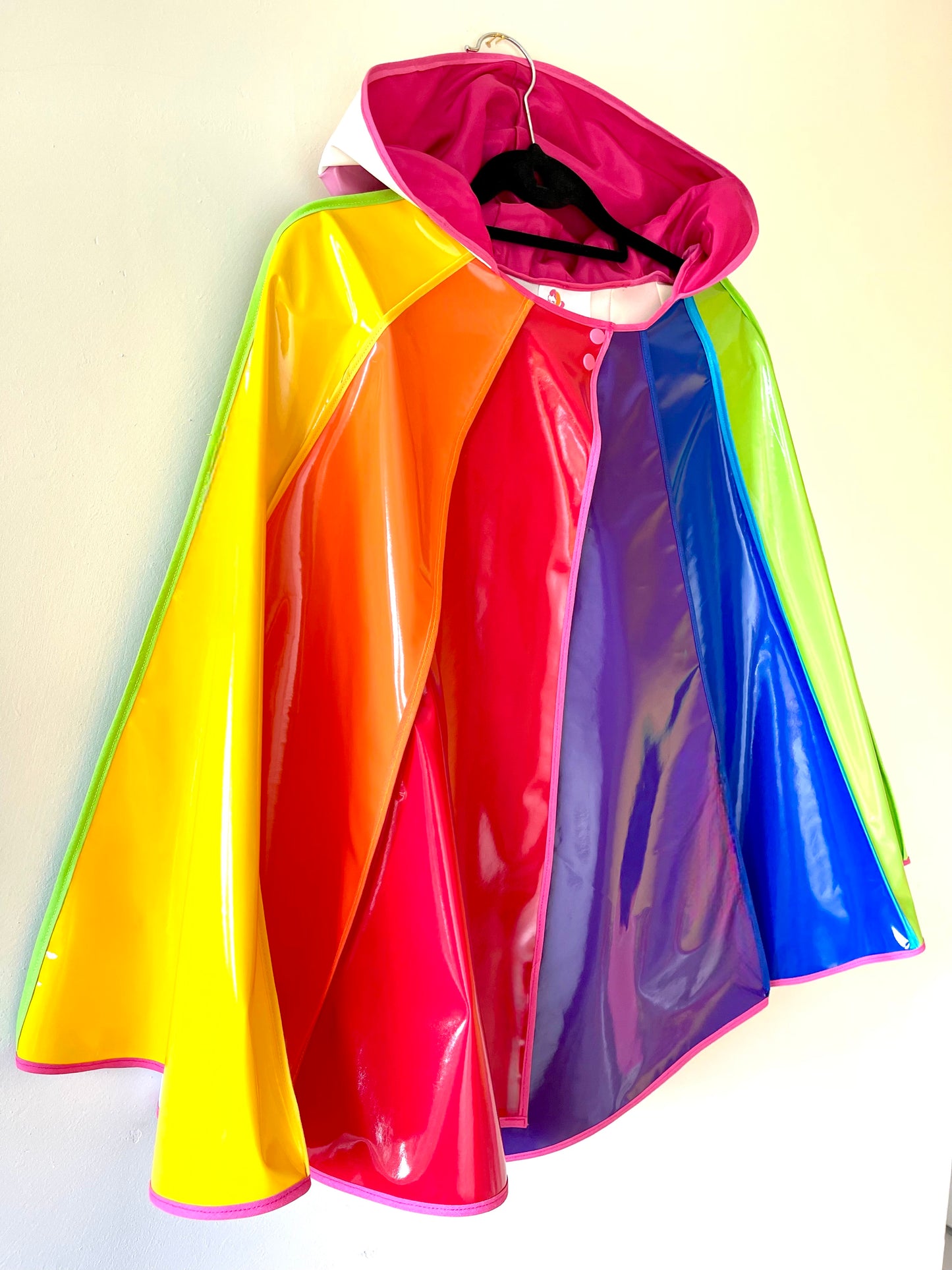 PRIDE cape: water-resistant cape. Feat. progress pride flag colours and intersex symbol.