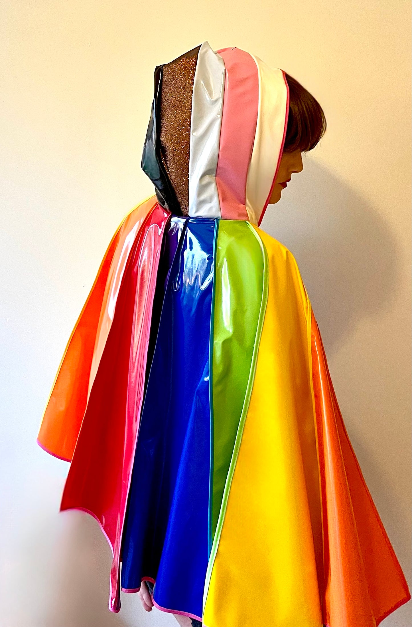 PRIDE cape: water-resistant cape. Feat. progress pride flag colours and intersex symbol.