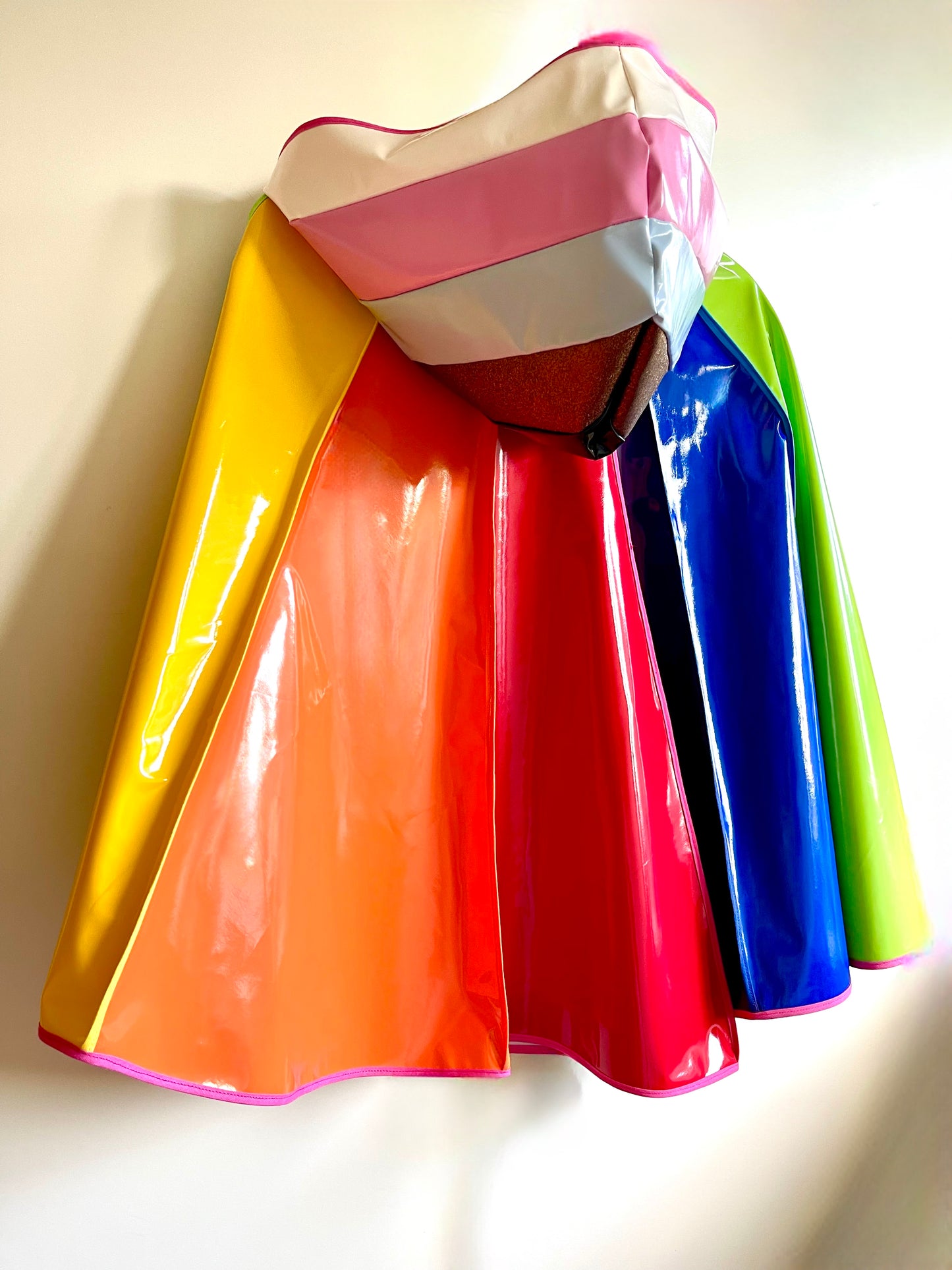 PRIDE cape: water-resistant cape. Feat. progress pride flag colours and intersex symbol.