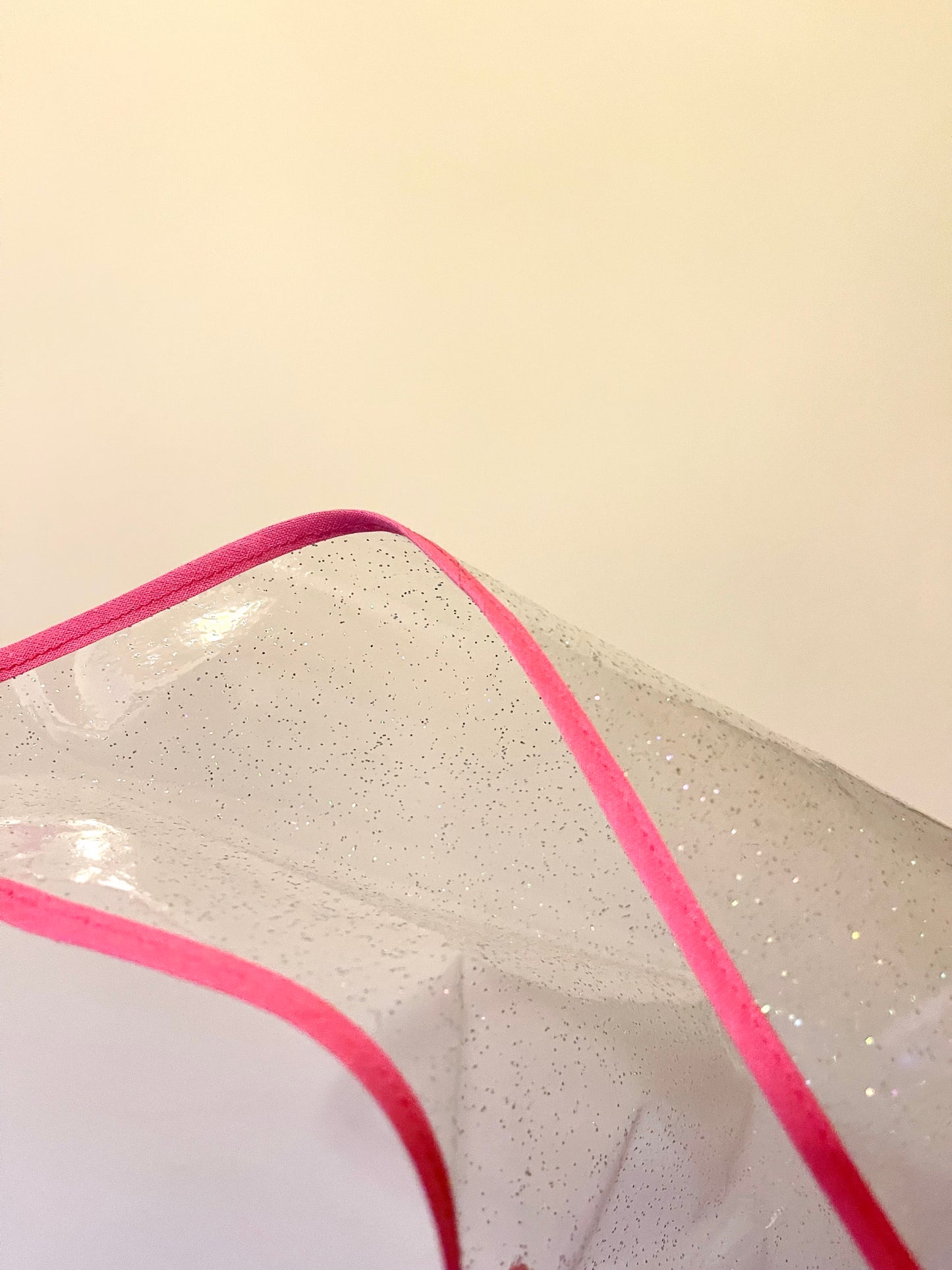 Mid-length NUDIE glitter cape: PINK