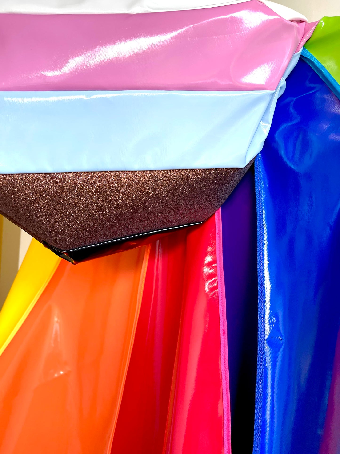 PRIDE cape: water-resistant cape. Feat. progress pride flag colours and intersex symbol.