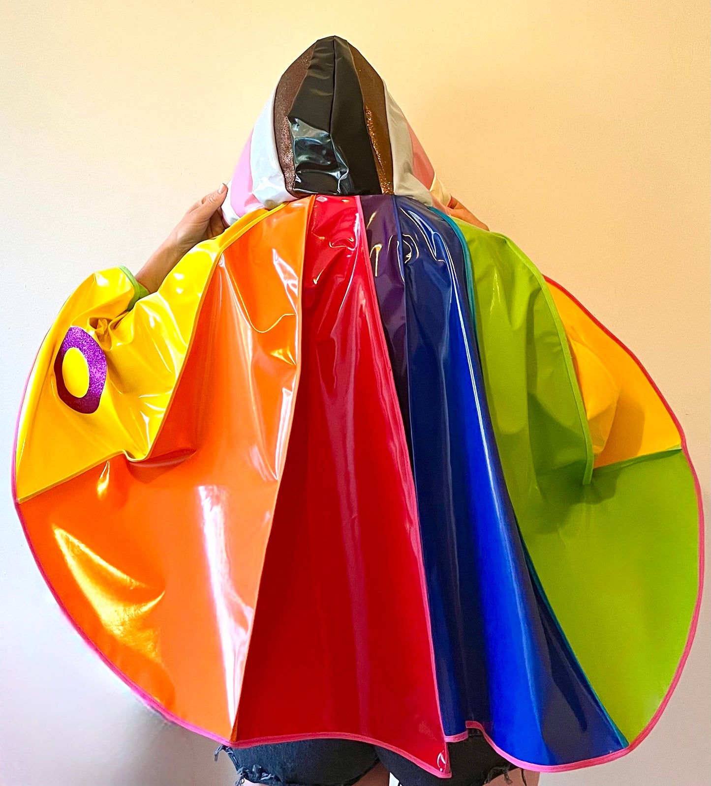 PRIDE cape: water-resistant cape. Feat. progress pride flag colours and intersex symbol.
