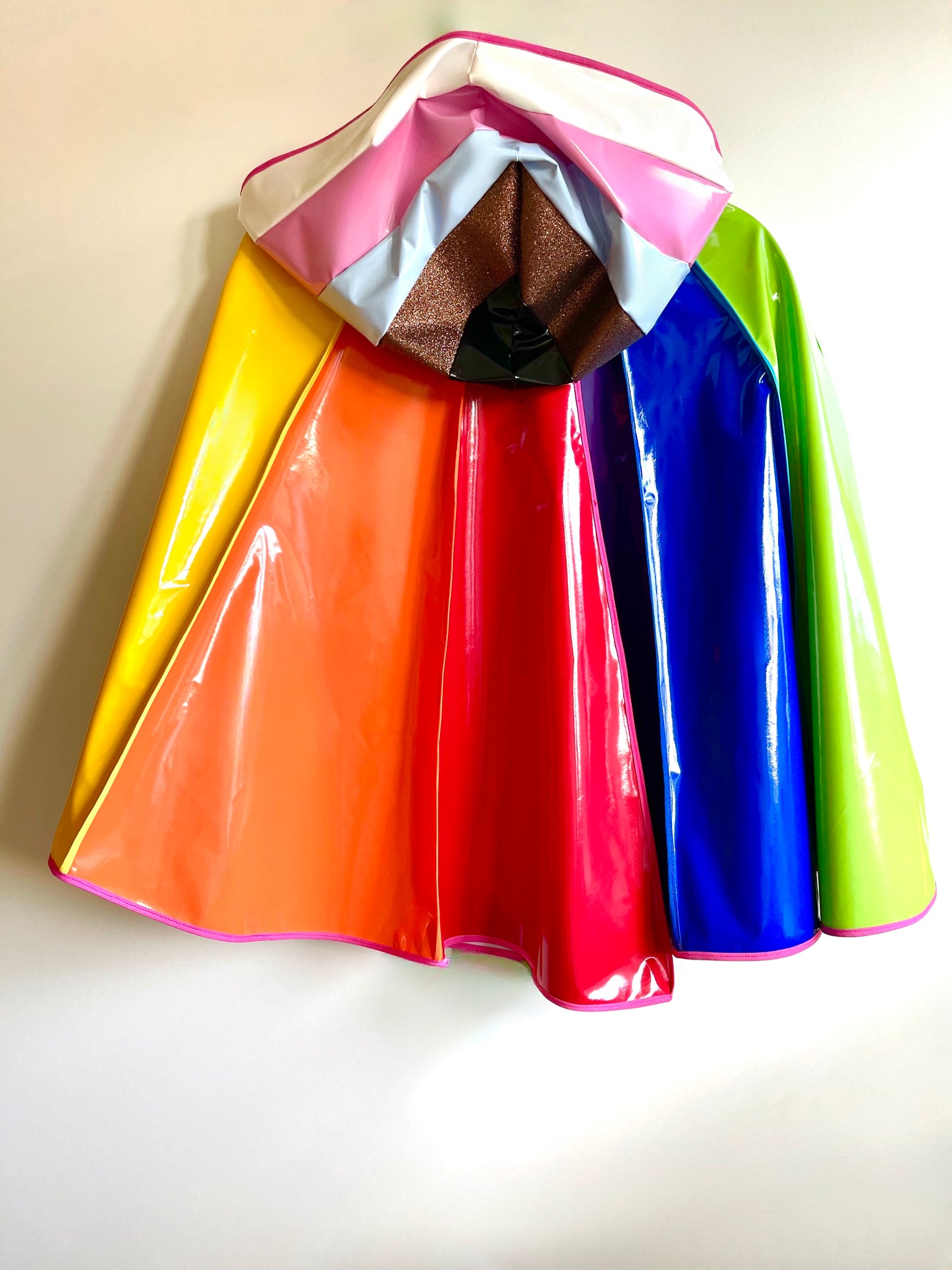 PRIDE cape: water-resistant cape. Feat. progress pride flag colours and intersex symbol.
