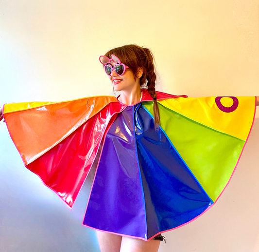 PRIDE cape: water-resistant cape. Feat. progress pride flag colours and intersex symbol.