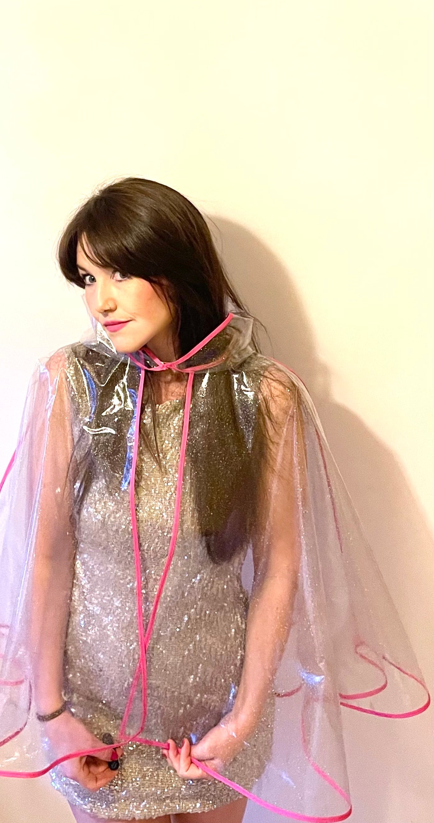 Mid-length NUDIE glitter cape: PINK