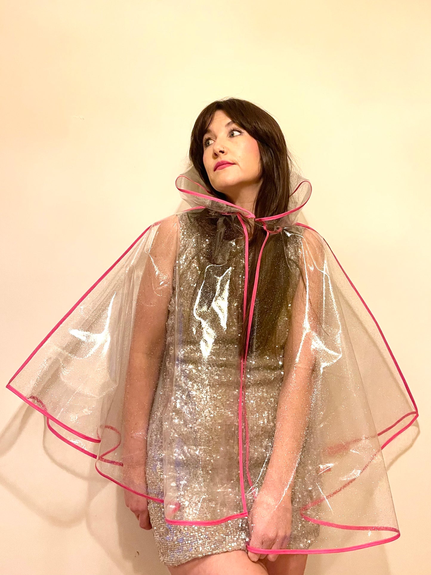 Mid-length NUDIE glitter cape: PINK