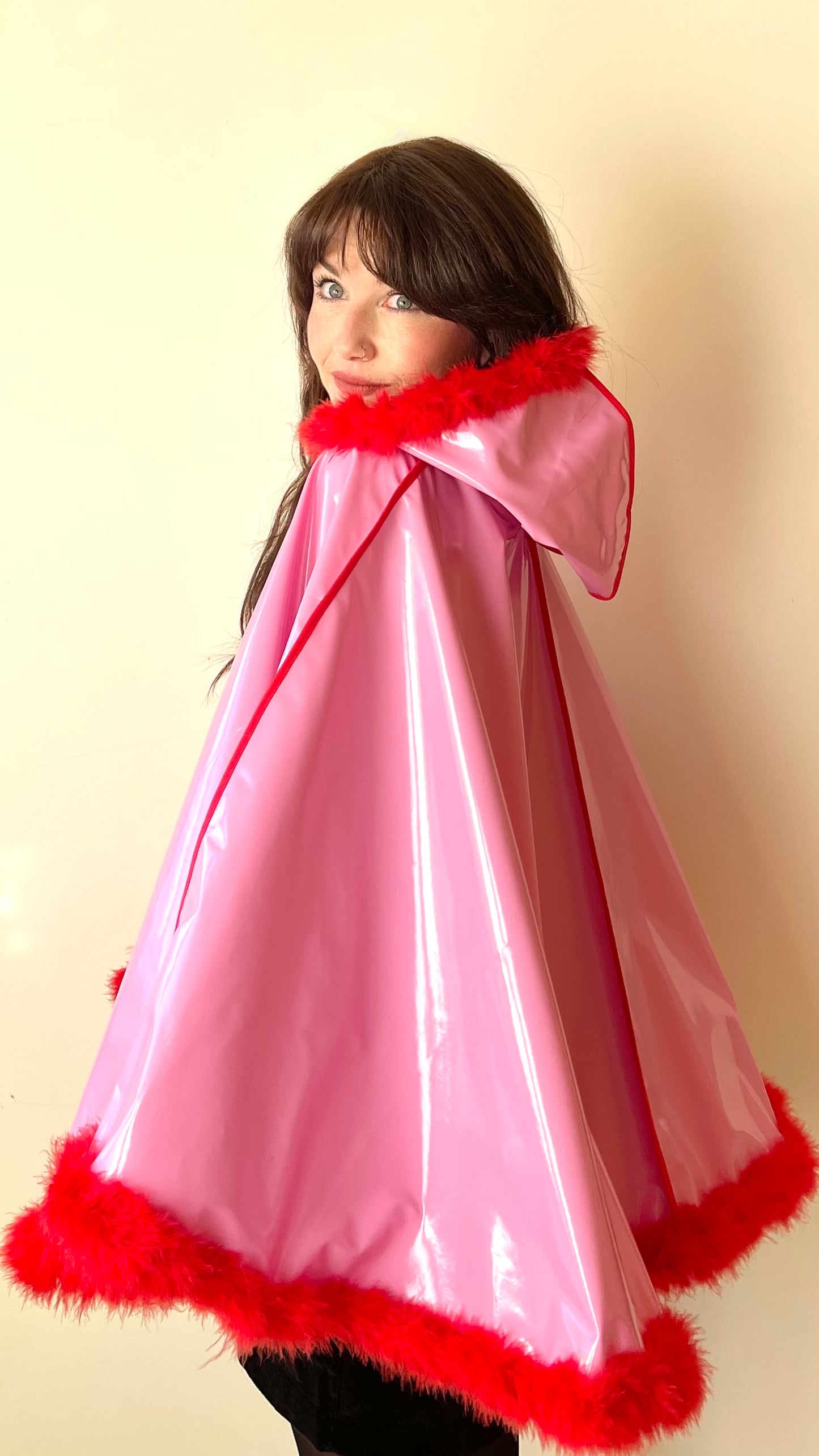 Barbie-Pink CYCLONE cape with red feather-trim