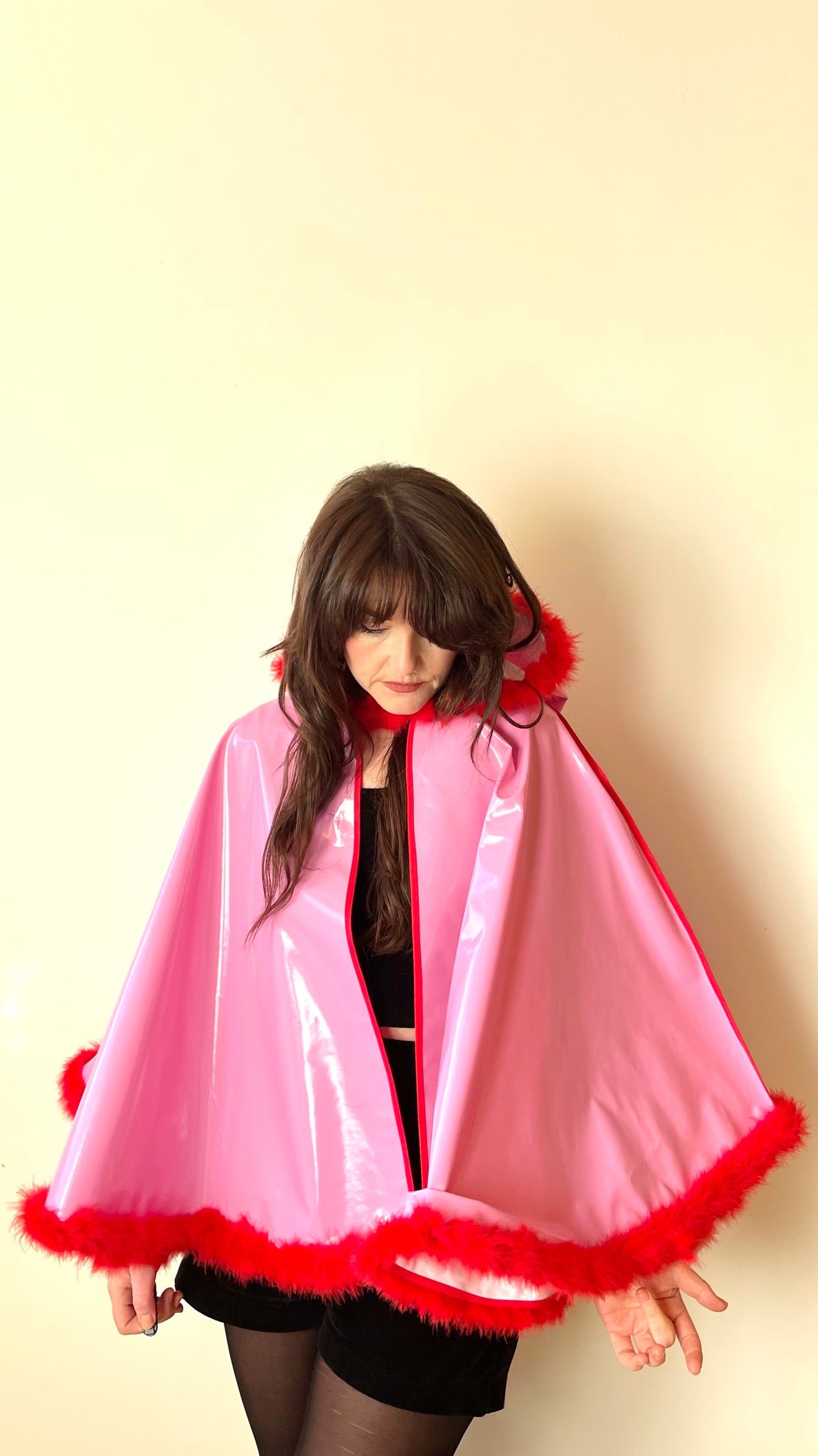 Barbie-Pink CYCLONE cape with red feather-trim