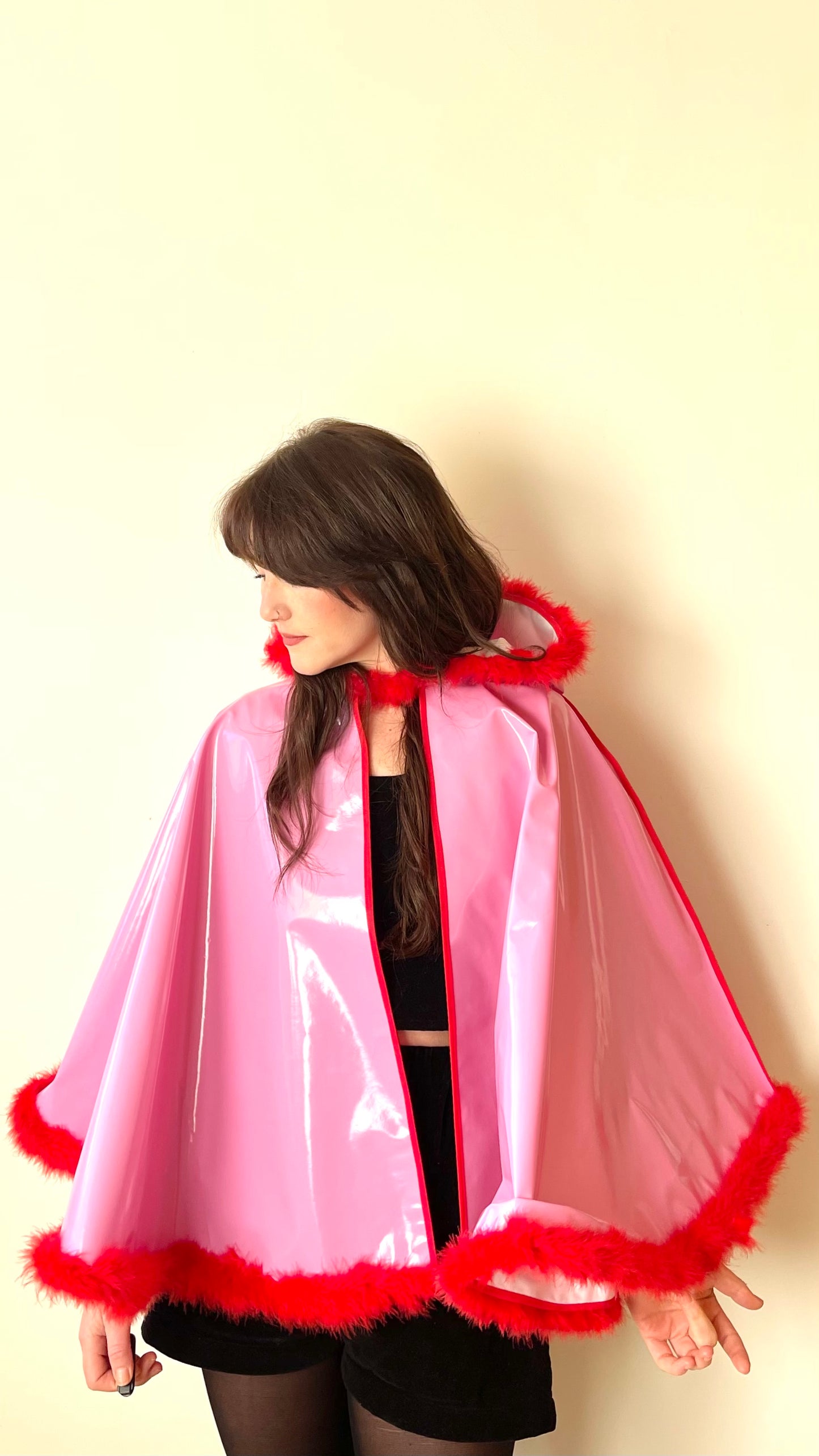 Barbie-Pink CYCLONE cape with red feather-trim