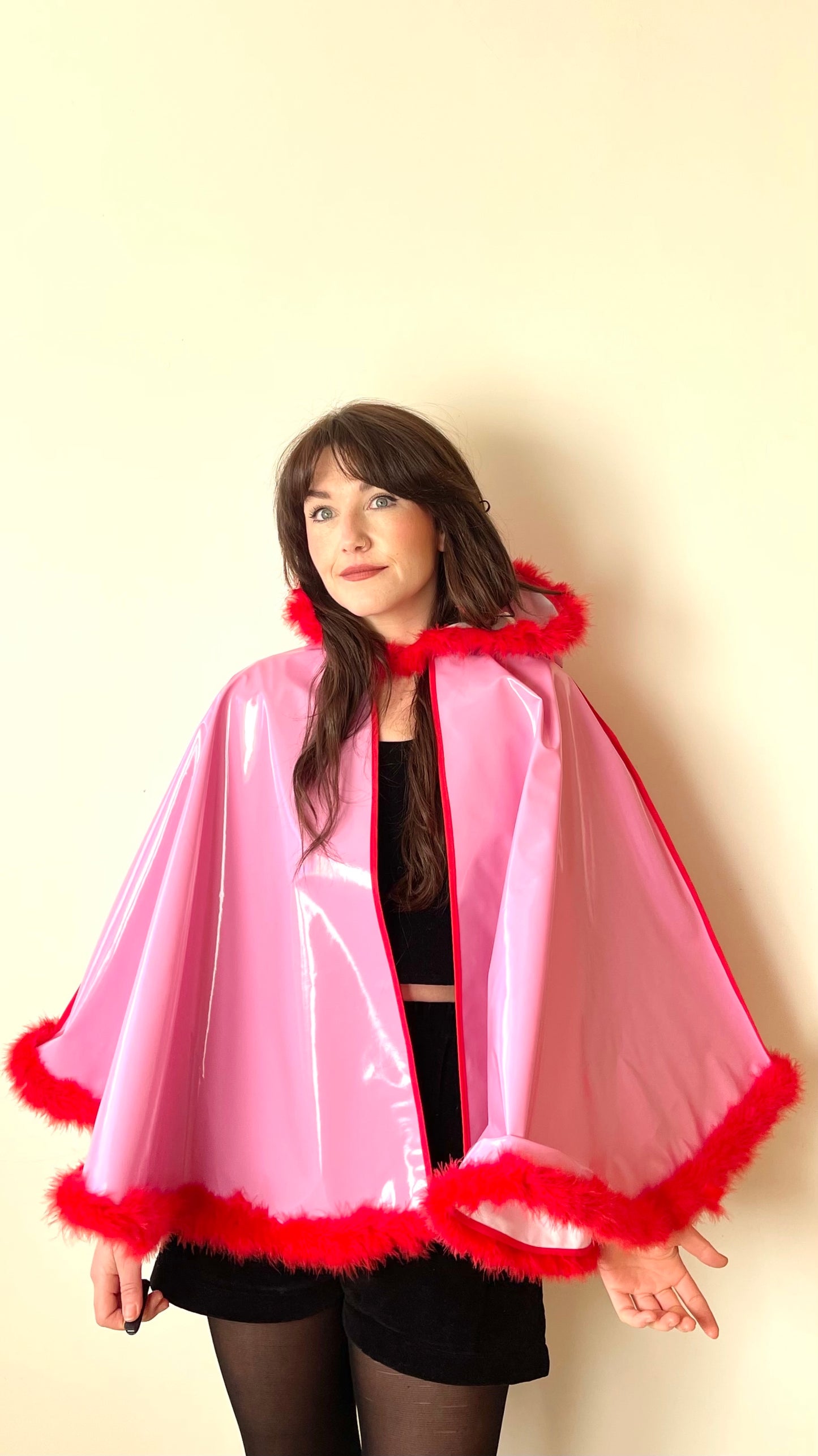 Barbie-Pink CYCLONE cape with red feather-trim