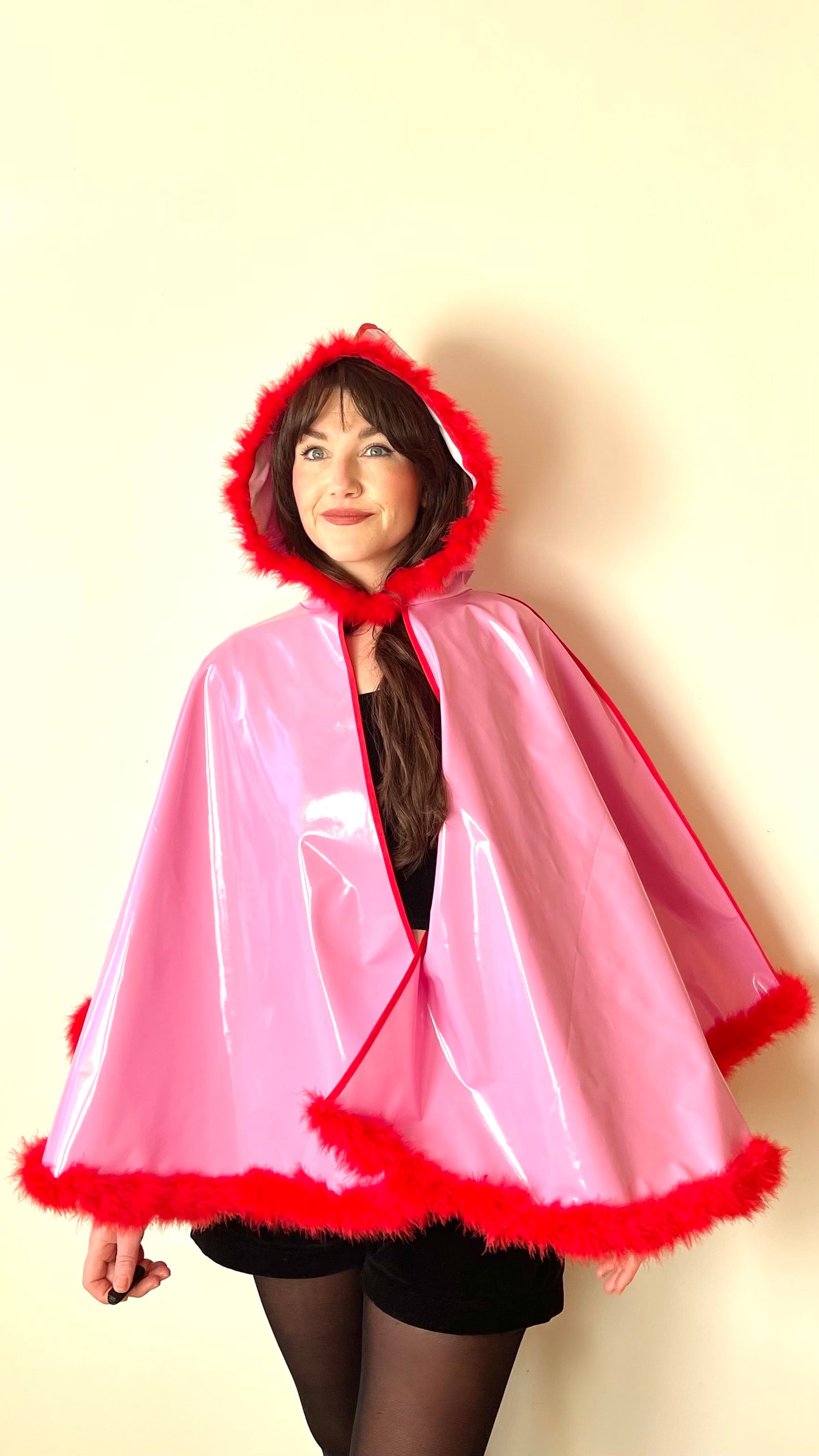 Barbie-Pink CYCLONE cape with red feather-trim