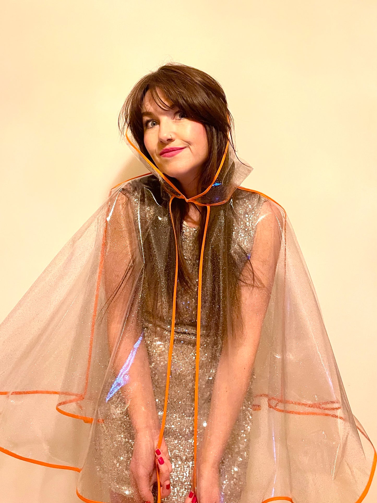 Mid-length NUDIE glitter cape: ORANGE